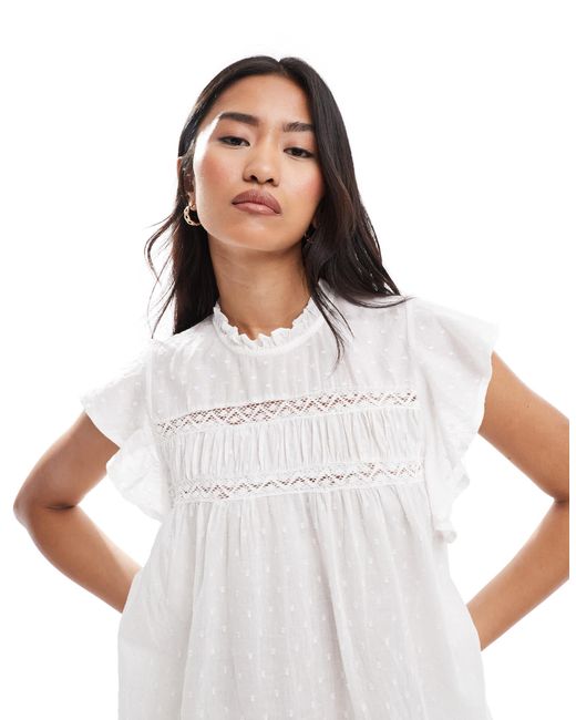 Top avec manches à volants et détails en plumetis ONLY en coloris White