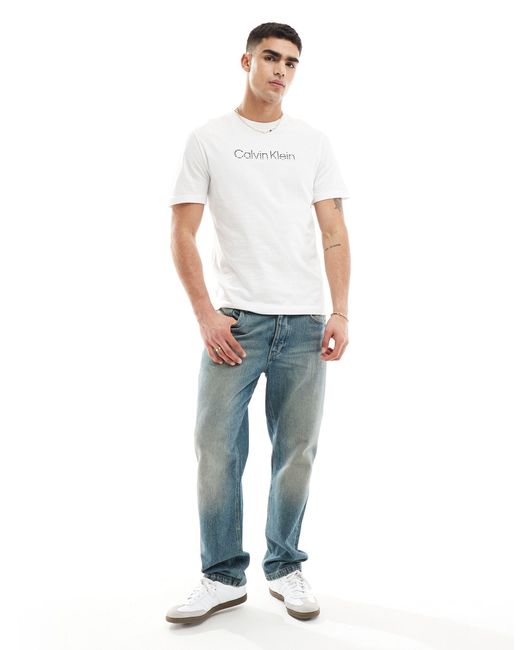 T-shirt bianca con logo sfumato di Calvin Klein in White da Uomo