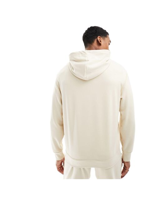 Sudadera con capucha y logo a tono en el centro Armani Exchange de hombre de color White