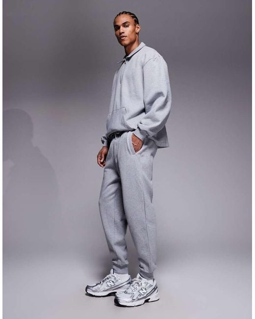 ASOS Natural Tapered joggers With Ribbed Cuffs for men
