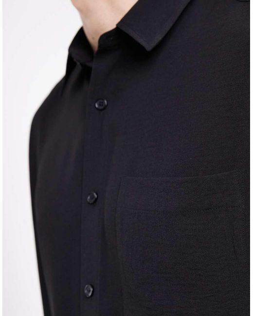 ASOS Black Oversized Sleeveless Shirt for men
