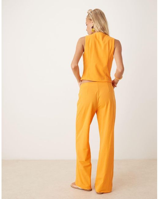 Pantalones De Sastre Papaya De Corte Acampanado De (Parte De Un Conjunto) Mango de color Orange