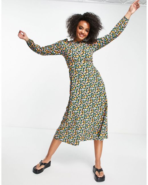 long sleeve open back midi dress