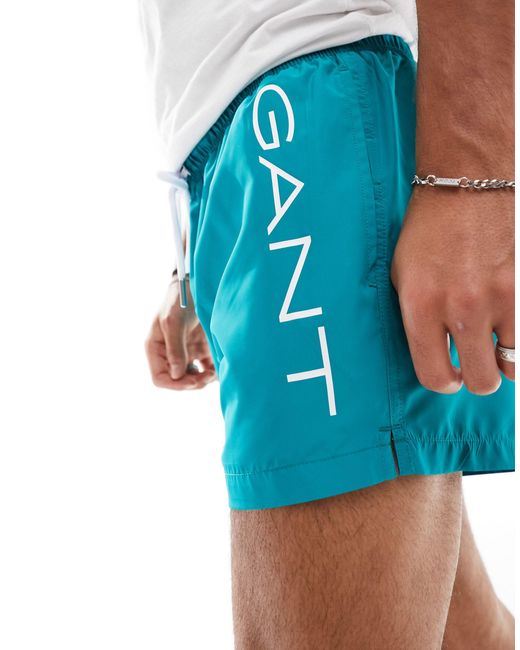 Pantaloncini da bagno con scritta laterale del logo di Gant in Blue da Uomo