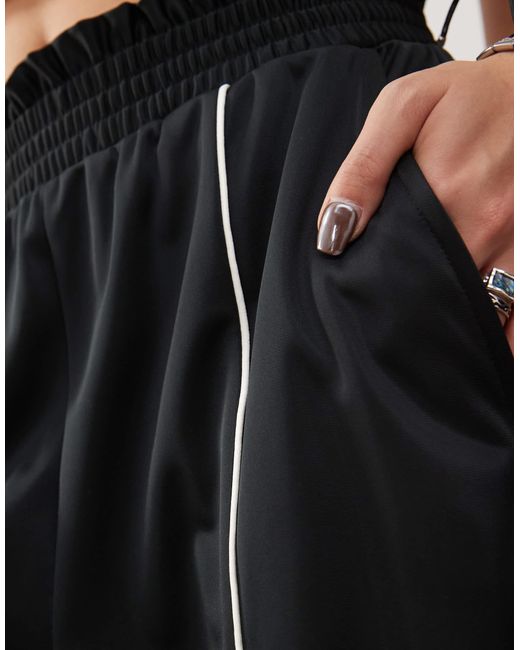 Monki Black Wide Leg Pull On Track Pant With Front Stripe