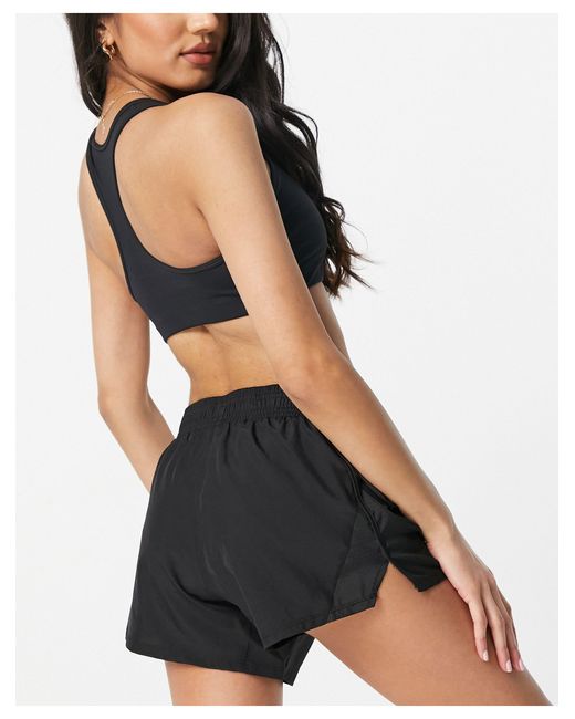 Pantalón corto Running 10k Mesh Nike de Tejido sintético de color Negro:  ahorra un 22 % | Lyst
