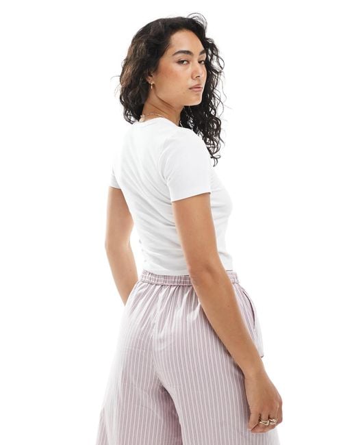 Gigi - t-shirt court à imprimé baies JJXX en coloris Black
