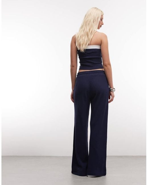 ASOS Blue Weekend Collective Waffle Wide Leg Sweatpants With Graphic