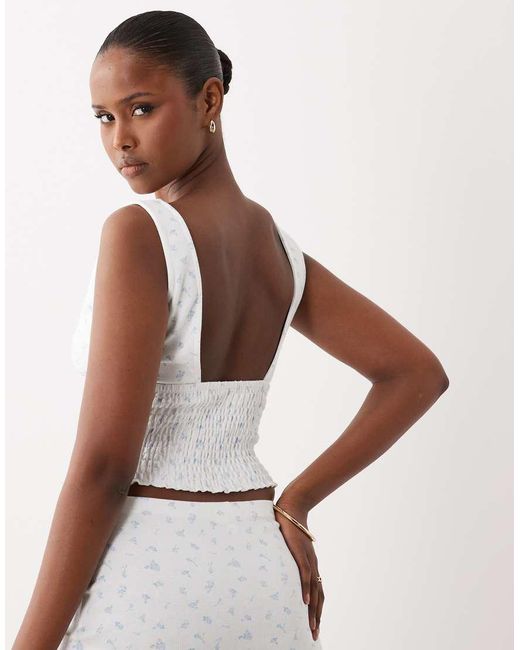 The Frolic White Exclusive Plunge Neck Shirred Waist Top