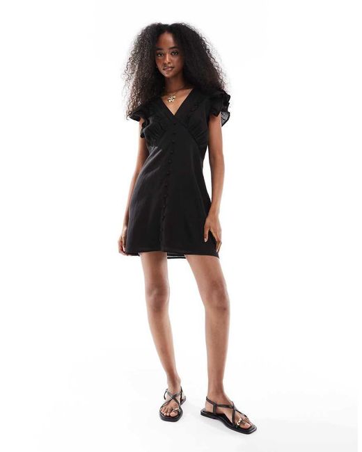 Wednesday's Girl Black Crochet Trim Frill Dress