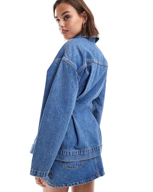 Premium - veste en jean d'ensemble avec surpiqûres à la taille - moyen délavé ASOS en coloris Blue