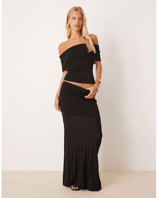Jupe d'ensemble longueur mollet en maille avec ourlet plongeant Pretty Lavish en coloris Black