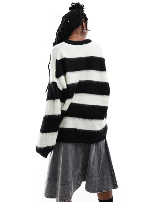 Lou - maglione oversize a righe grigie e nere con scollo a v di AllSaints in Black