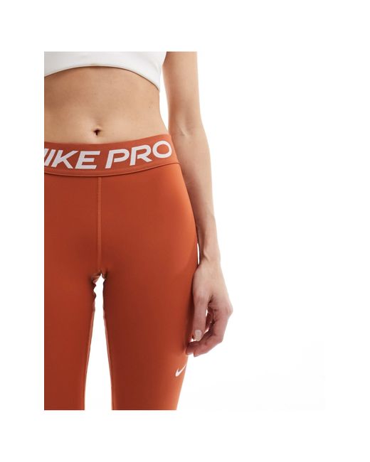 Nike White Nike Pro Training 365 Mid Rise 7/8ths leggings