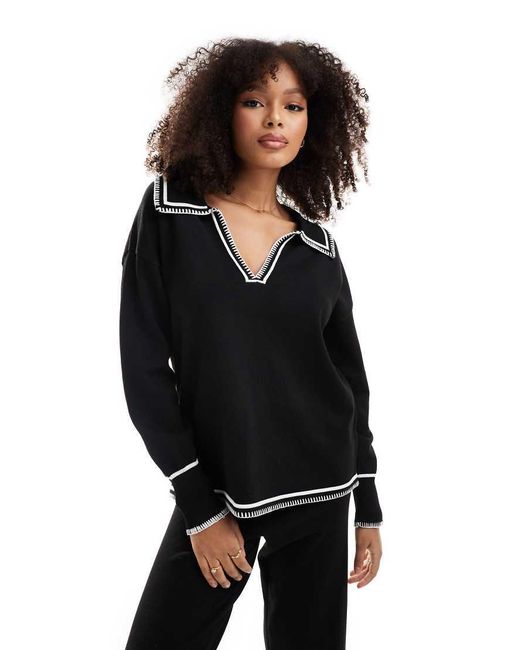 Maglione Lavorato Con Cuciture Bianche Sul Colletto di SNDY'S in Black