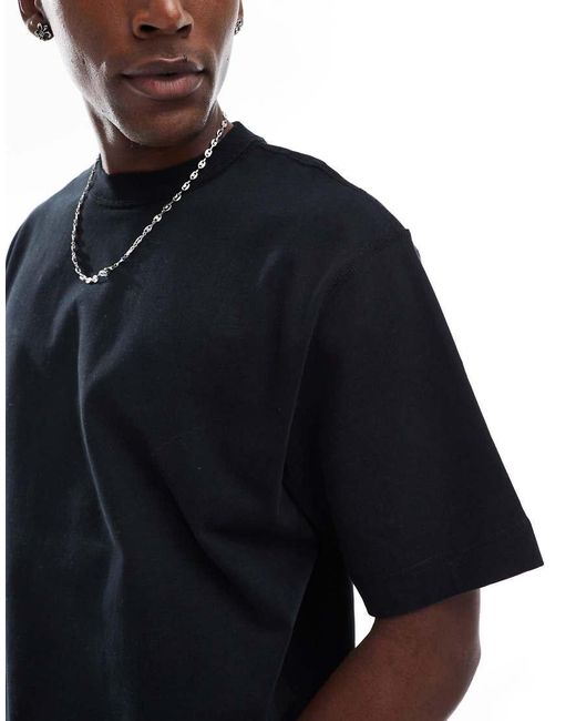 T-Shirt Squadrata Nera Manopesca di Pull&Bear in Blue da Uomo