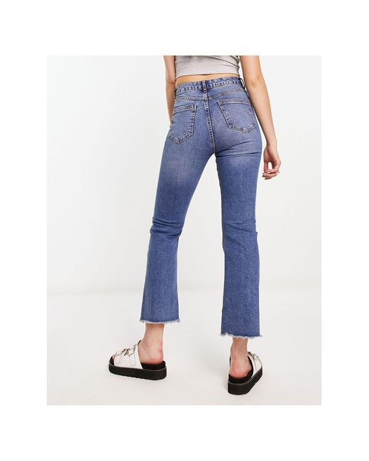 Jeans a zampa corti lavaggio medio di Miss Selfridge in Blu | Lyst