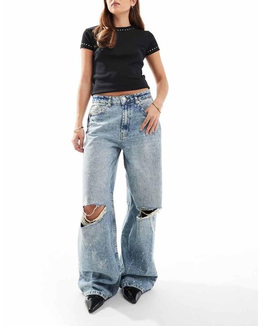 ASOS Blue Mid Rise Baggy Boyfriend Jeans With Rips And Paint Splats