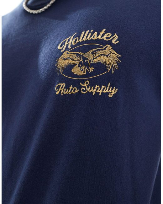 T-shirt squadrata scuro con stampa sul retro di Hollister in Blue da Uomo