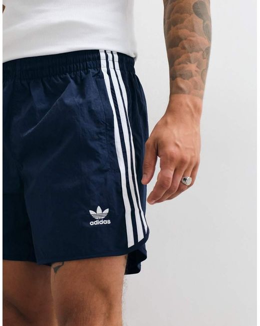 Adidas Originals Blue Adicolor Polyester 3 Stripe Shorter Shorts for men