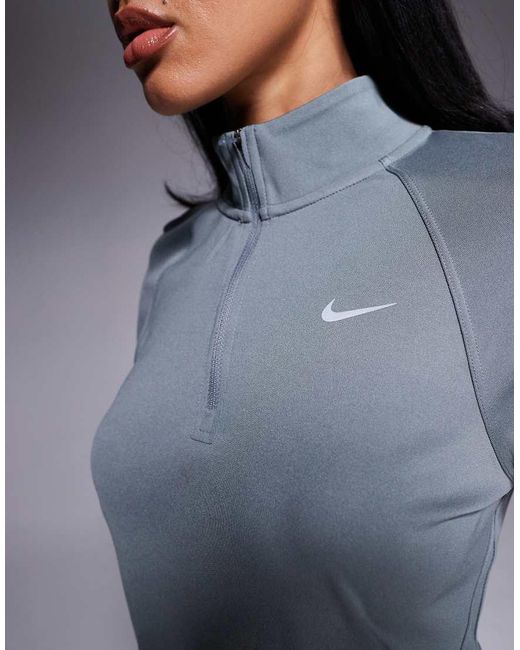Camiseta De Manga Larga Con Media Cremallera Dri-Fit Tempo De Nike de color Blue