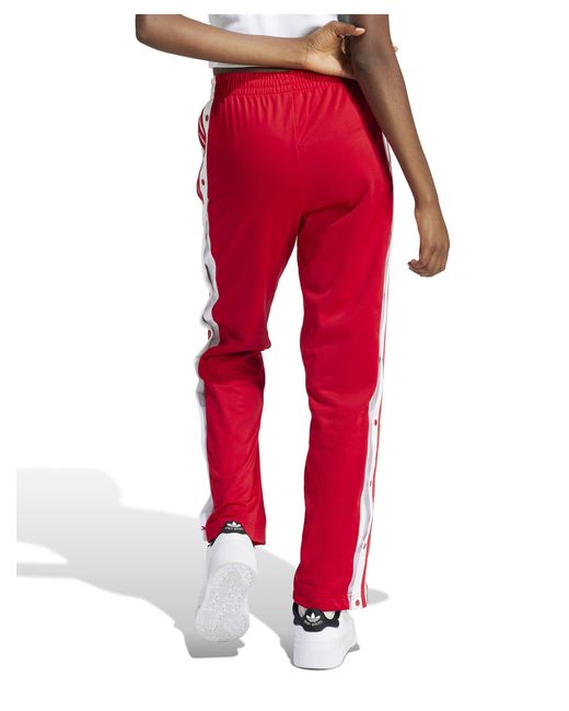 Adibreak - pantaloni rossi con bottoni a pressione di Adidas Originals in Red