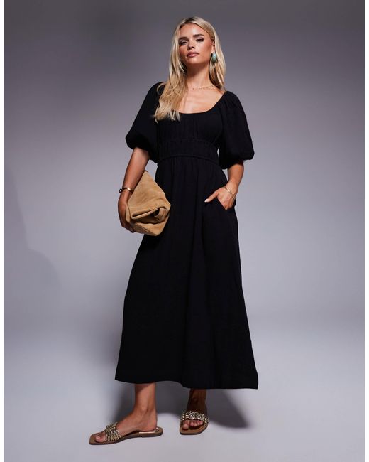 Robe mi-longue en aspect lin avec manches bouffantes River Island en coloris Black