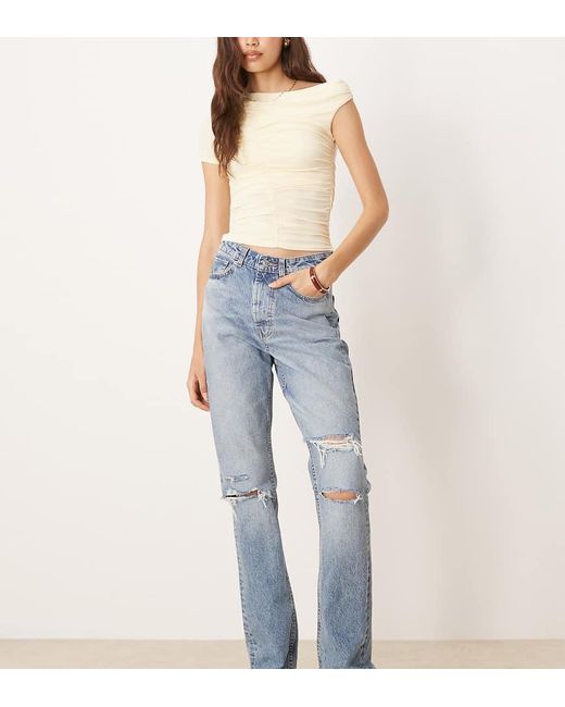 Vaqueros De Corte Recto Y Talle Medio Con Lavado Claro Y Detalles Rasgados Circular Design Collection De Asos Design Tall-Azul ASOS de color Blue
