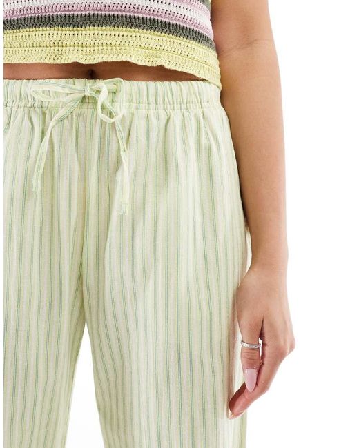Bershka Gestreepte Broek Van Linnenmix Met Gestrikte Taille En Wijde Pijpen in het White