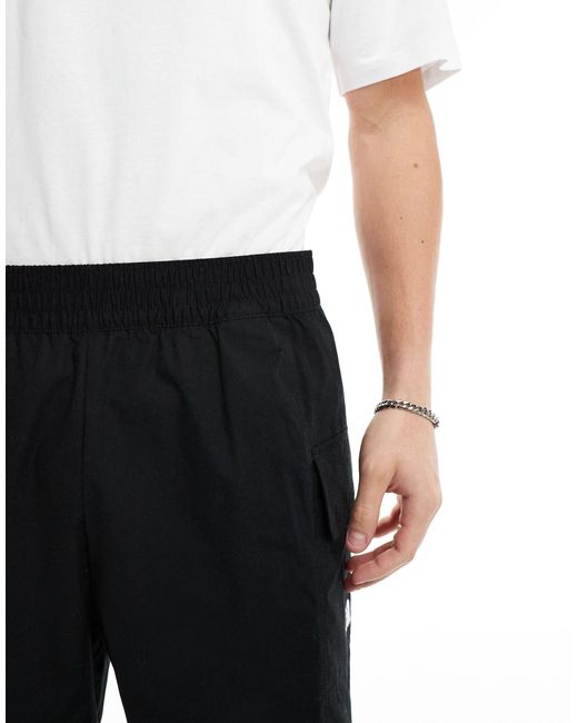 The North Face Black Logo Pocket Shorts for men
