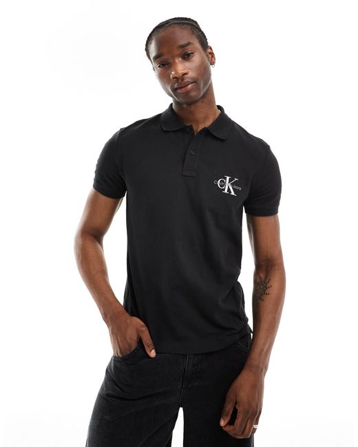 Polo à logo monogramme Calvin Klein pour homme en coloris Black