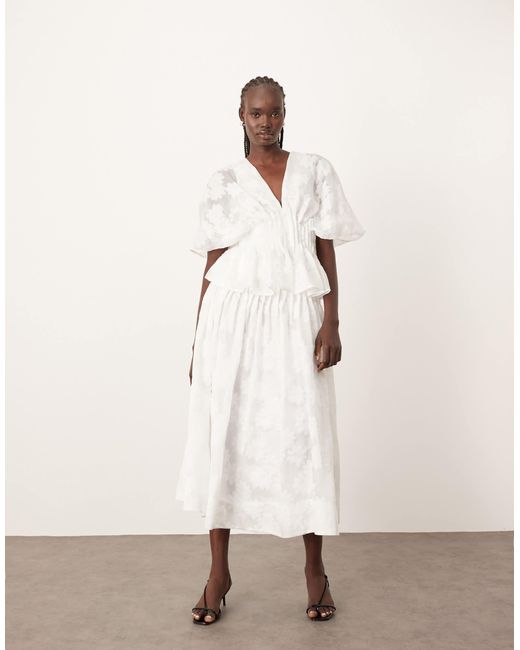 Jupe d'ensemble mi-longue à taille basse et nervures en organza à motif pâquerettes ARRANGE en coloris Natural