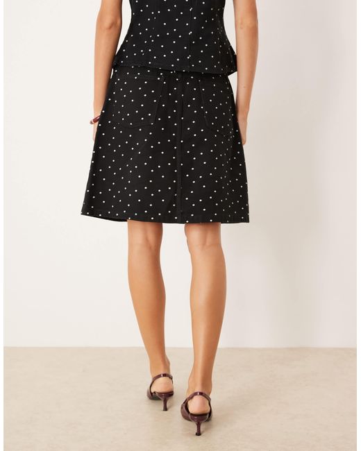 ASOS Black Awkward Length Denim Skirt With Mini Polka Dots