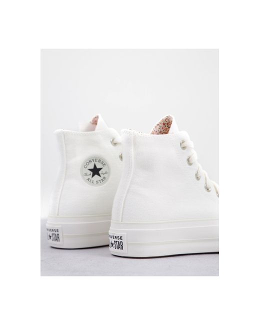 white floral converse