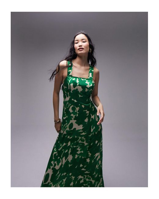 Robe chasuble mi-longue croisée dans le dos à fleurs avec poches TOPSHOP en  coloris Vert | Lyst