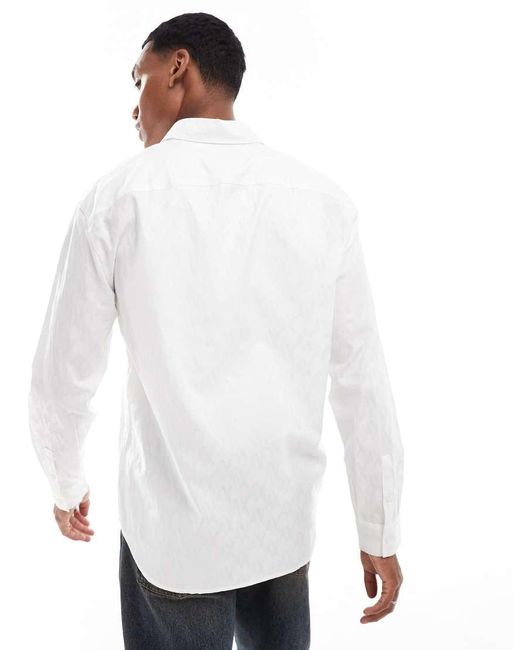 ARMANI EXCHANGE White All Over Logo Printed Long Sleeve Shirt With Satin Shine Effect for men