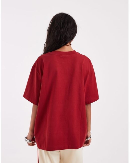 ASOS Red Oversized T-shirt With Spiral Apple Graphic