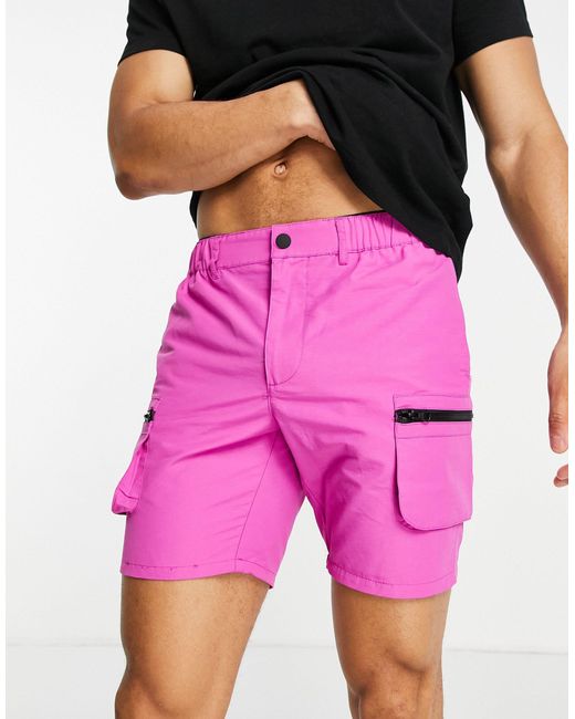 Pantalones cortos slim de nailon con bolsillos cargo en intenso ASOS de  Tejido sintético de color Rosa para hombre - Lyst