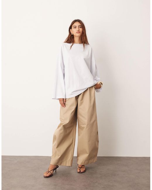ARRANGE White – langärmliges oversize-t-shirt aus baumwolle