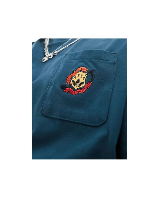 T-shirt navy con logo sulla tasca di Adidas Originals in Blue da Uomo