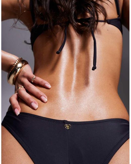 Slip Bikini Sgambati Neri Con Dettaglio di Candypants in Black