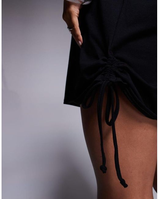 Vestido Corto Estilo Camiseta Con Lazadas Fruncidas En El Lateral De Algodón De Fashionkilla de color Blue