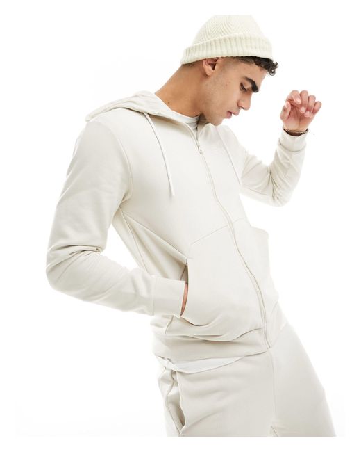 Emporio armani - survêtement avec sweat à capuche avec logo devant et au dos et fermeture éclair et jogger - beige EA7 pour homme en coloris White