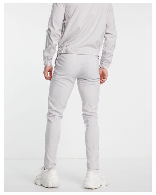 Pantaloni eleganti skinny lilla da Uomo di ASOS in Viola | Lyst