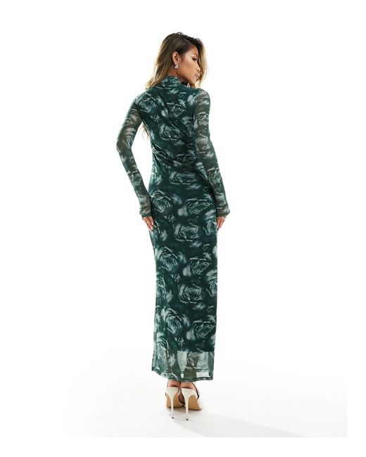 Robe mi-longue à imprimé roses avec manches longues et découpes au niveau du col - vert ASOS en coloris Green