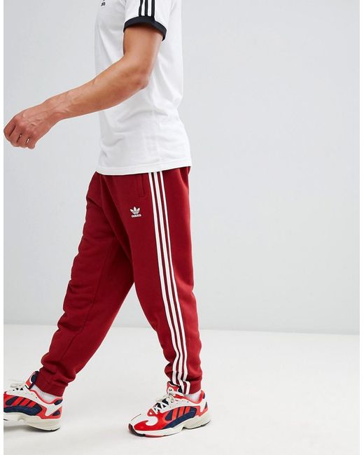 Adicolor - Pantalon de jogging à 3 bandes - Rouge CW2428 adidas pour homme  en coloris Rouge | Lyst