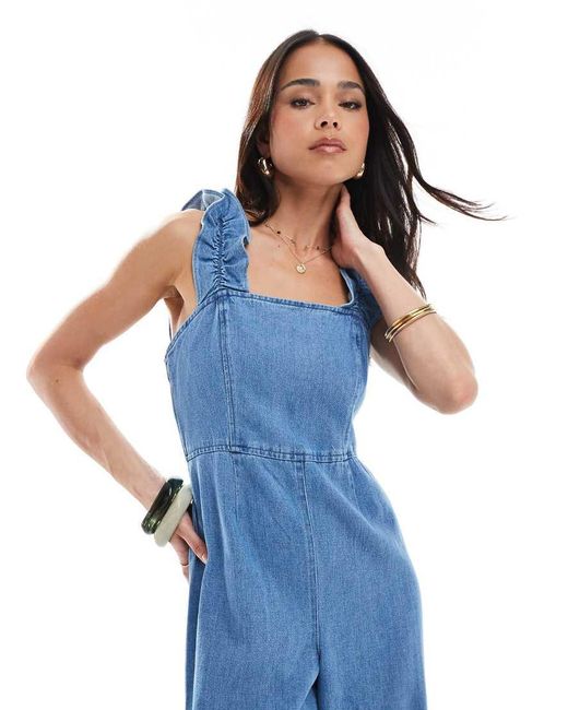 Mono Vaquero Largo Con Volantes En Los Tirantes De Tejido Suave De ASOS de color Blue