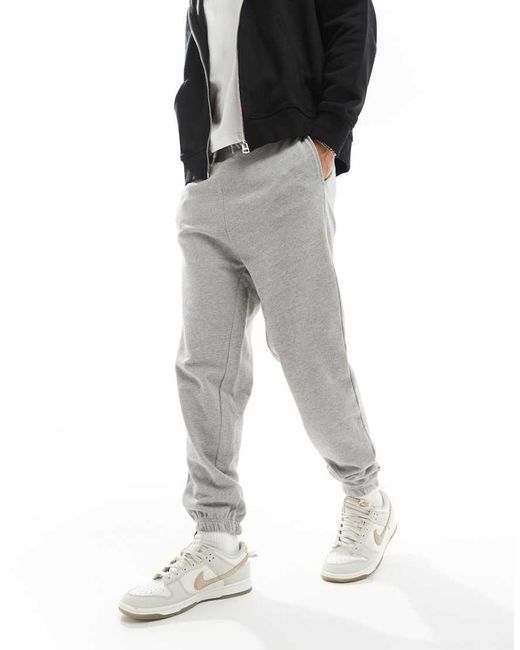 Joggers Gris Claro De Corte Suelto Con Bajos Ajustados De Jack & Jones de hombre de color Gray