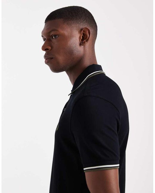 Polo Nera Con Righe Doppie A Contrasto Su Maniche E Colletto di Fred Perry in Black da Uomo
