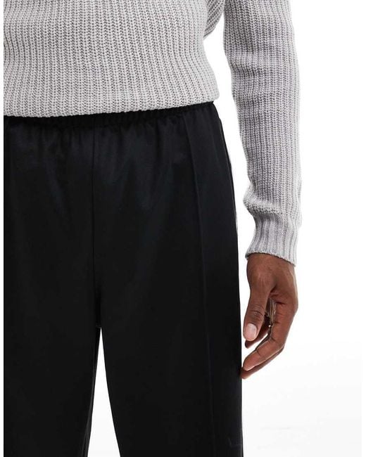 Adidas Originals Black Firebird Loose Track Pants for men